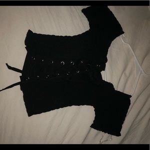 Black top, off shoulder, and brand new with tags.